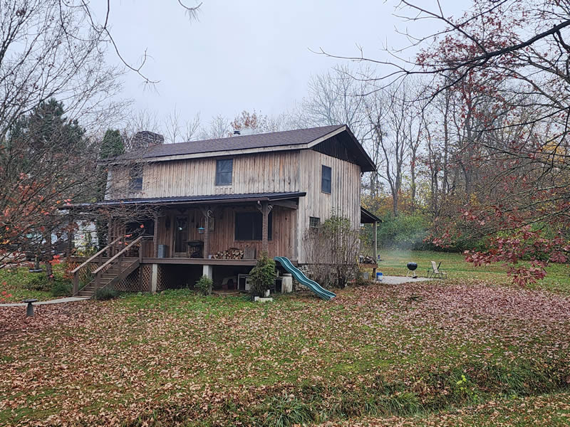 Removing mold and algae,  house washing a cabin in Hillsboro Ohio 